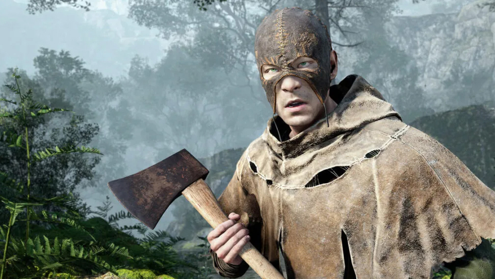 bucwxbshv4m7rljun2skuo A masked man with an axe in the woods