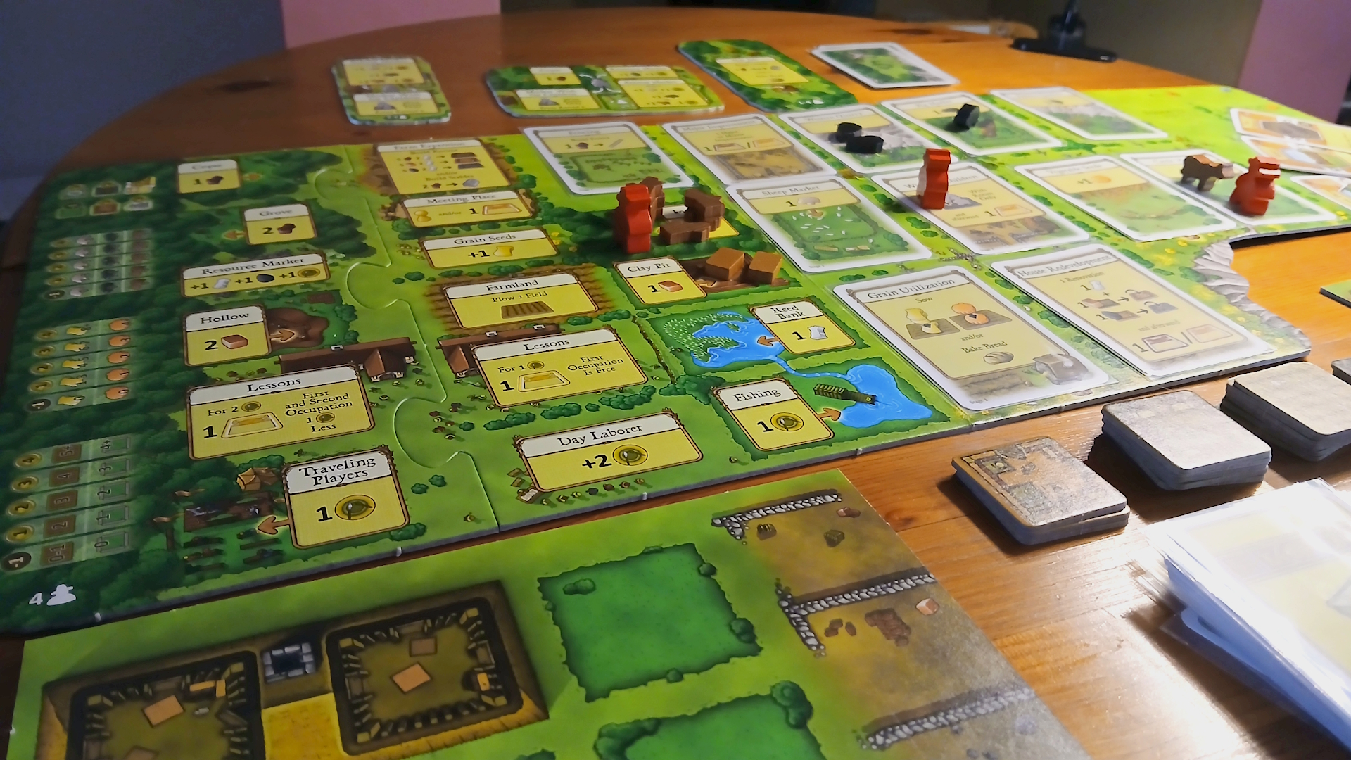 Photographs of the Agricola board game in play