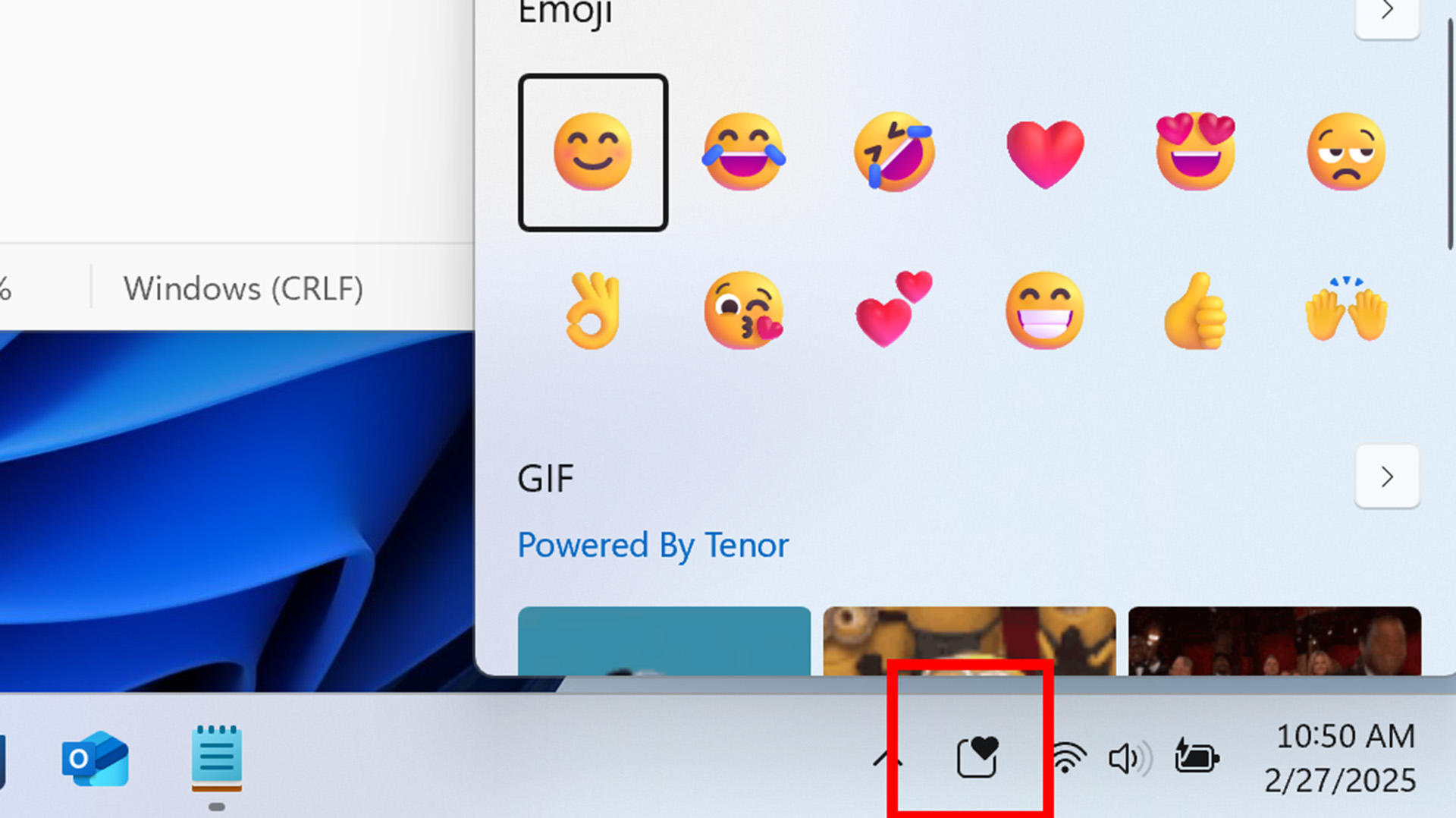 Windows 11's new emoji button in the taskbar.