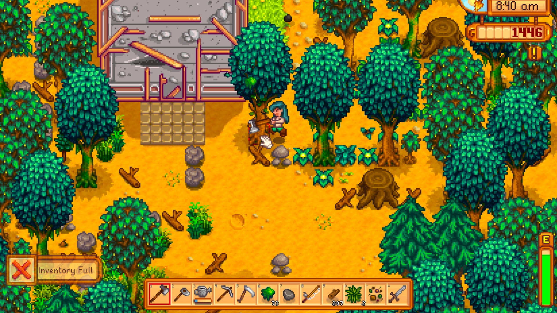 Chopping moss from a tree in Stardew Valley