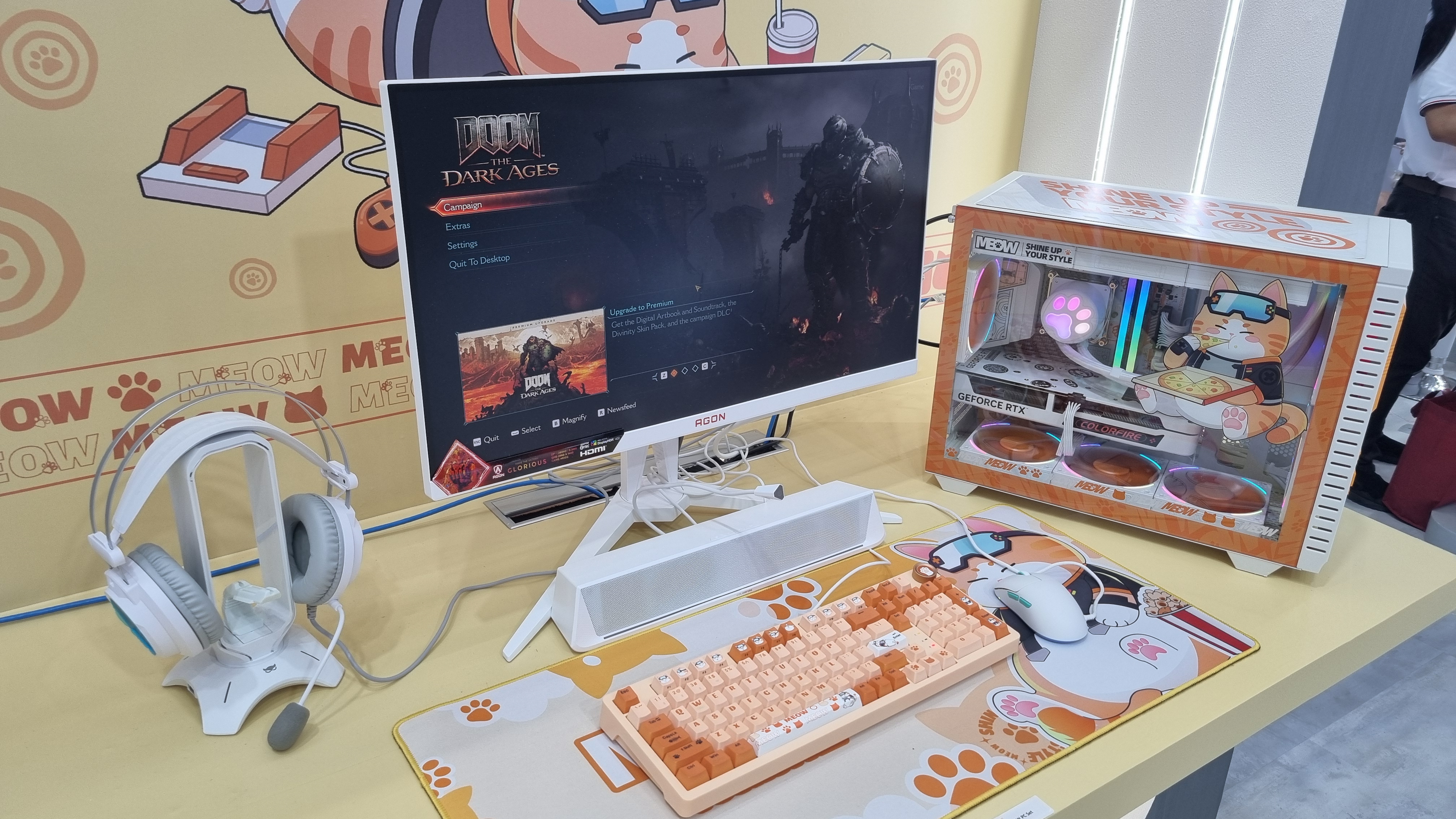 Colorful's Colorfire Meow range as seen at Computex 2025. The cat-themed PC is seen playing Doom: The Dark Ages .