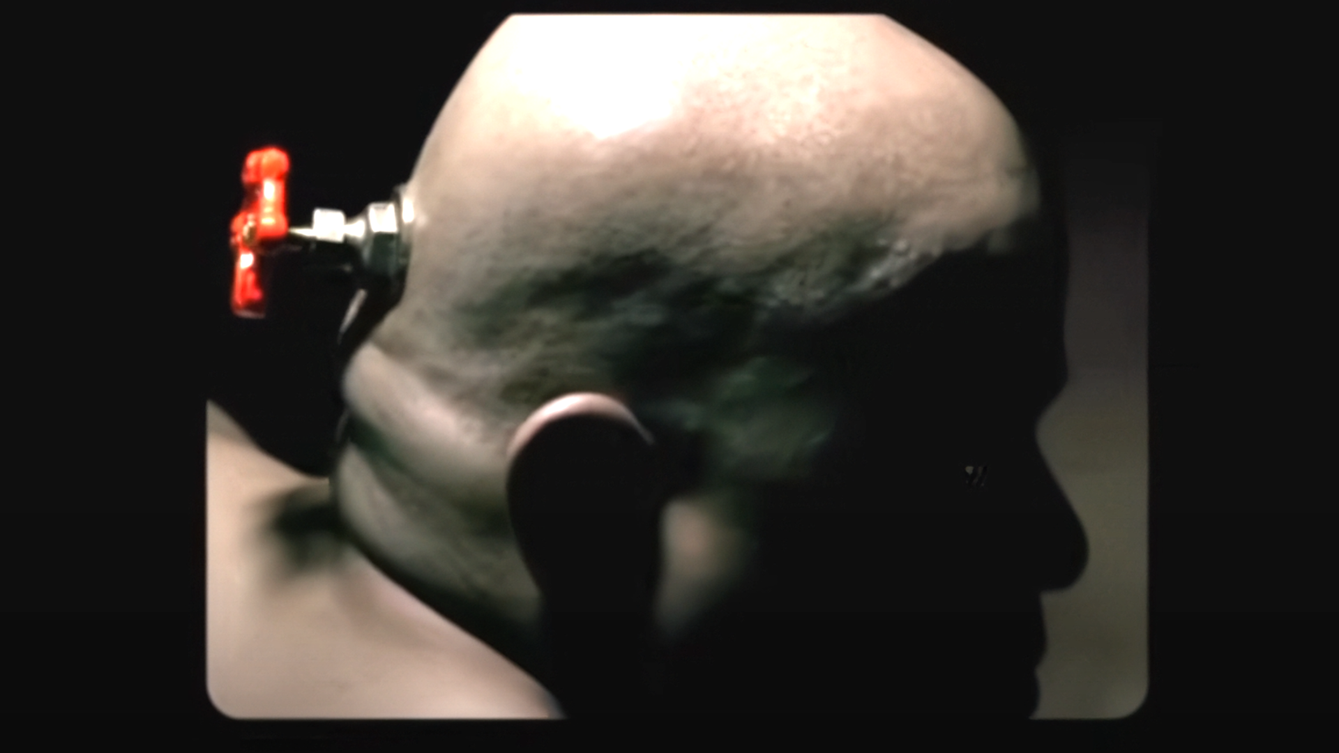The Valve guy from the Portal 2 intro slowly looks over his shoulder in ominous fashion.
