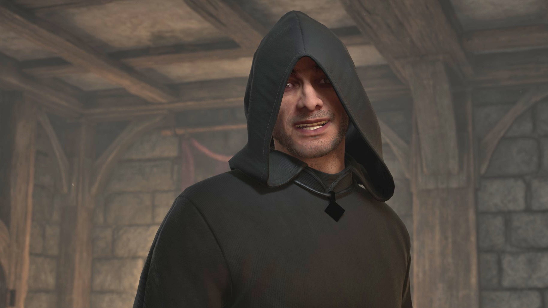Lucien Lachance, a Dark Brotherhood member in a black hood and robes, gives a rictus grin into the camera.