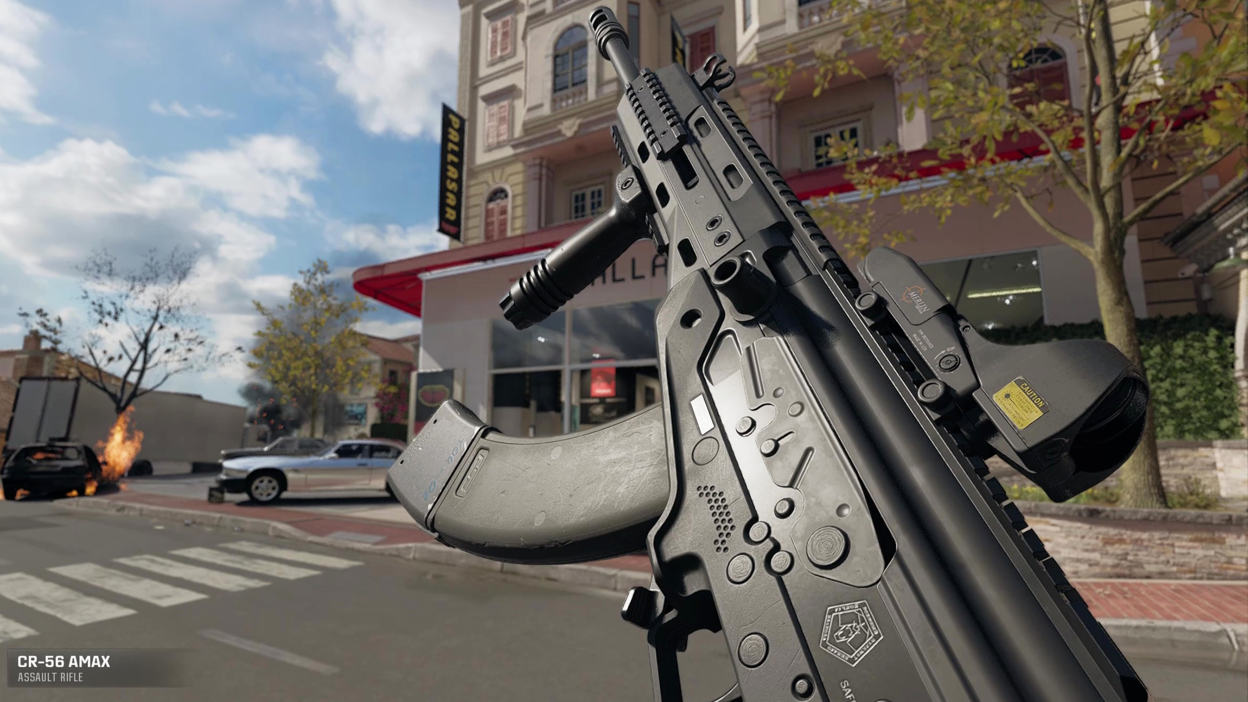 BO6 CR-56 loadout - A player inspecting the right side of the rifle, holding it up, in a street.