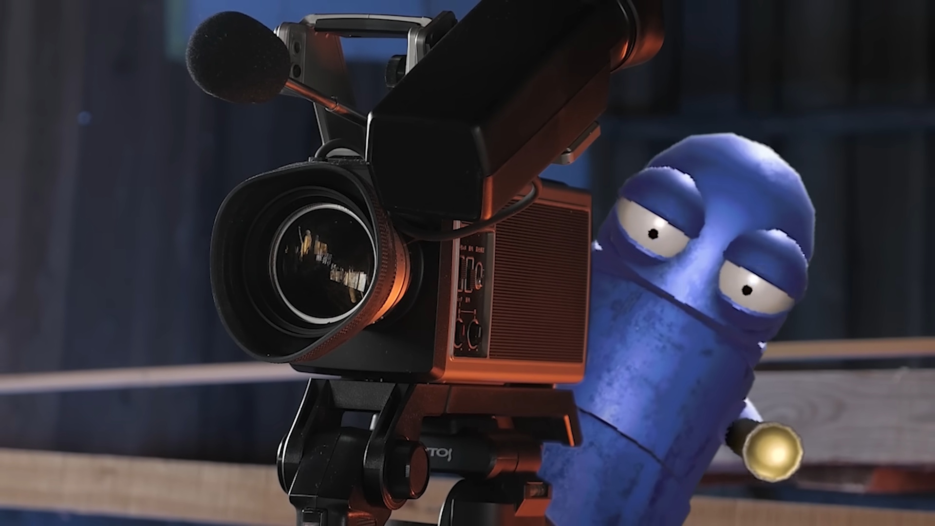 REPO blue robot manning a camera