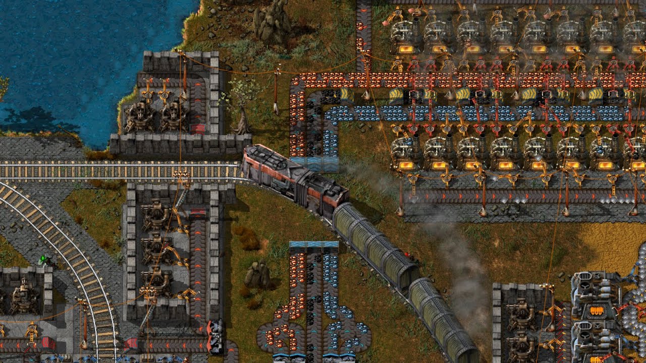Factorio screenshot shows a train near engines and kilns.