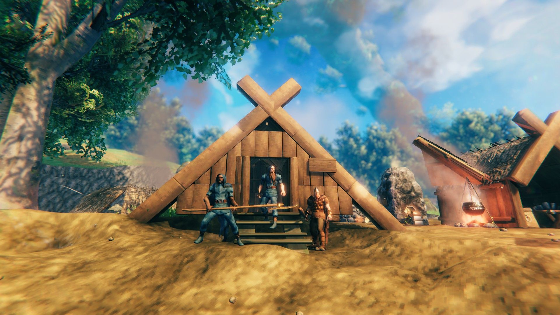 Valheim screenshot shows characters standing in front a wooden hut