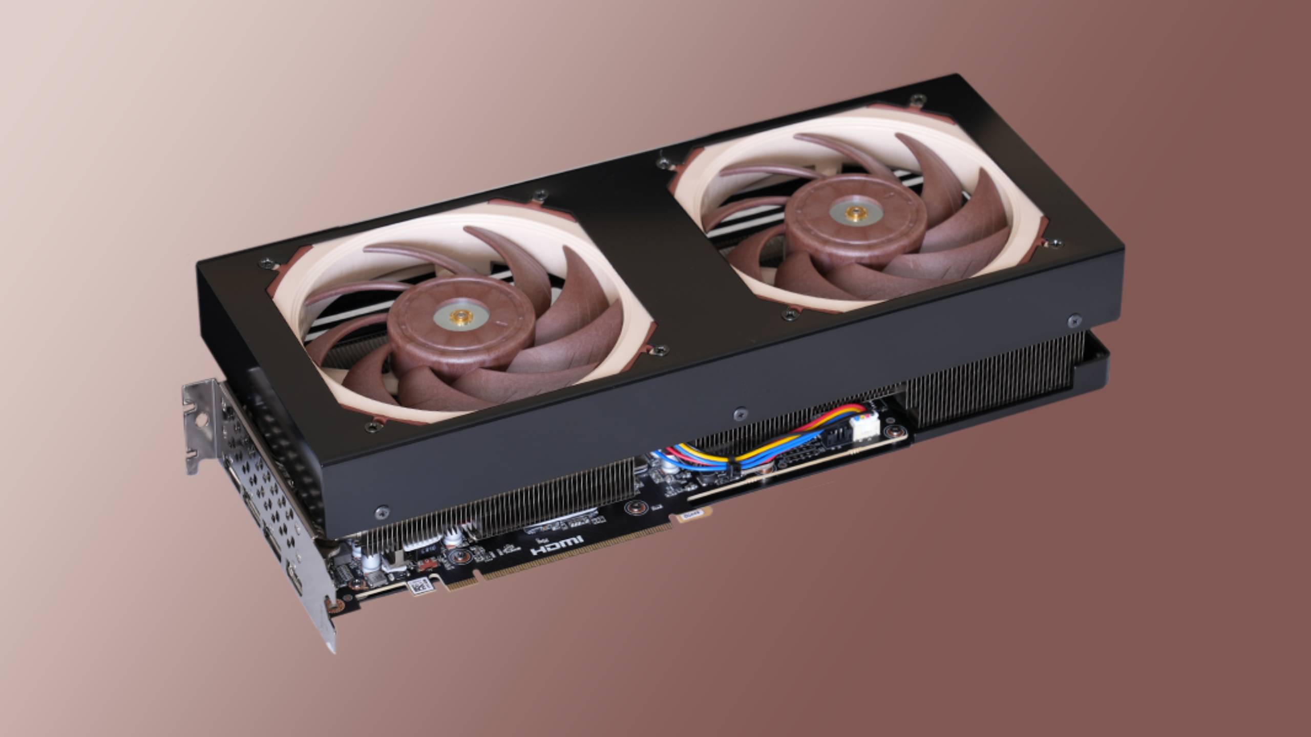 Sycom Silent Master RTX 5070 Ti with Noctua fans on a brown and cream background