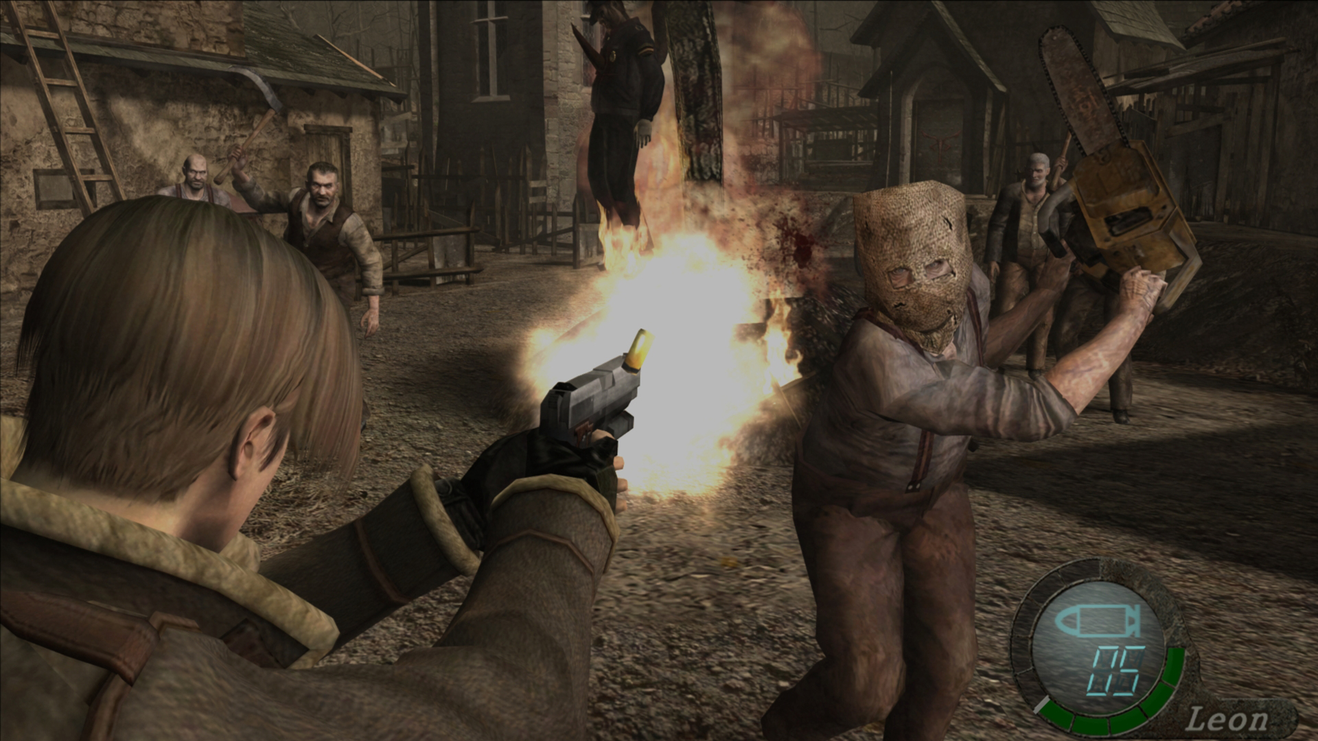 Resident Evil 4 screenshot of Leon Kennedy shooting the sack-head chainsaw guy, AKA Dr Salvador, during the village encounter.