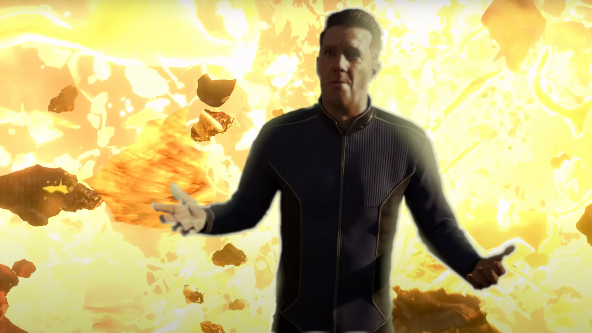 qzmgq76xqmt3otghnjvmqc-1 An edited screenshot of the Super Earth spokesperson shrugging in bewilderment as an explosion detonates behind him.