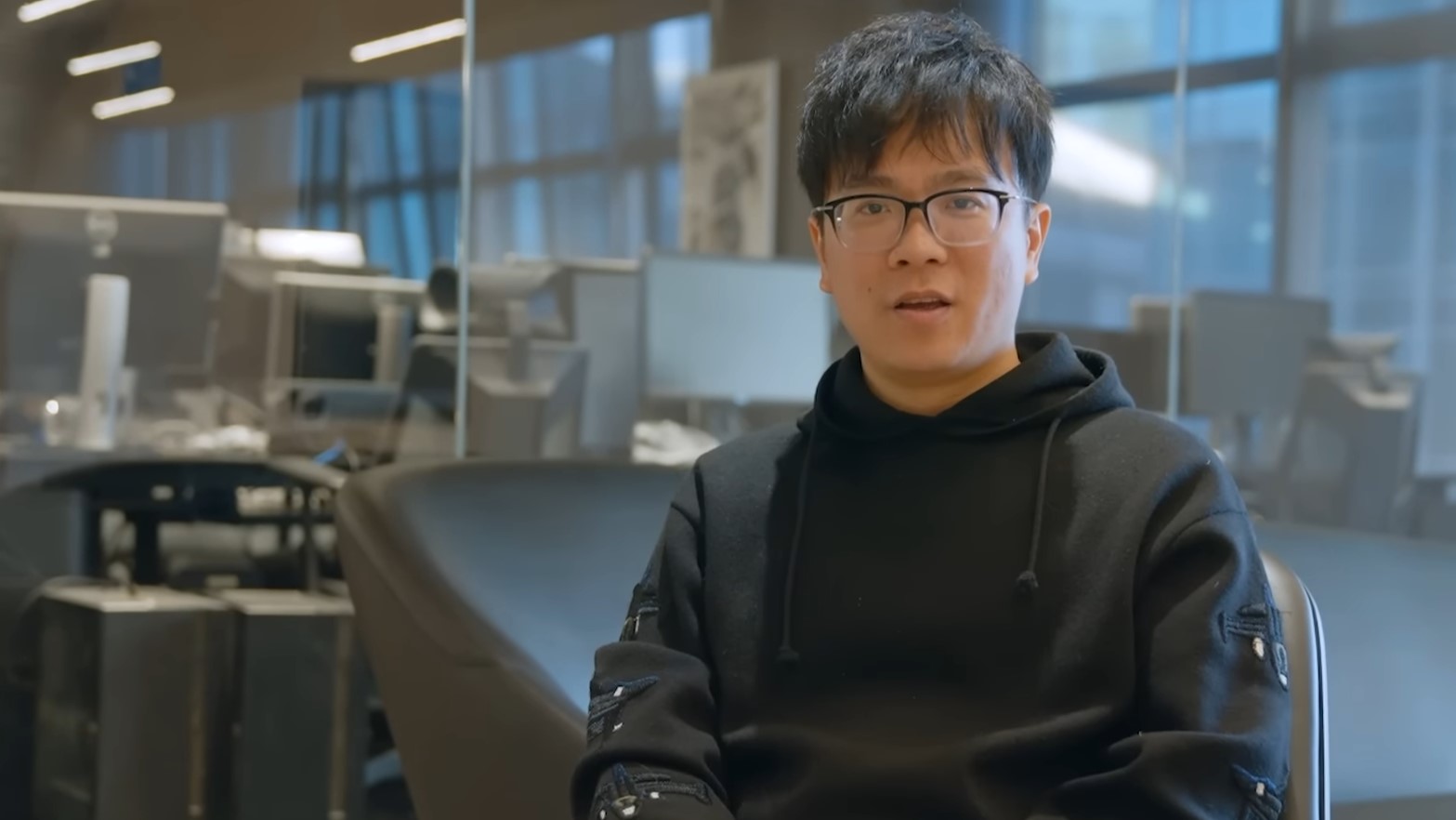 Soulframe Liang sits for an interview in a behind-the-scenes video for Phantom Blade: Zero