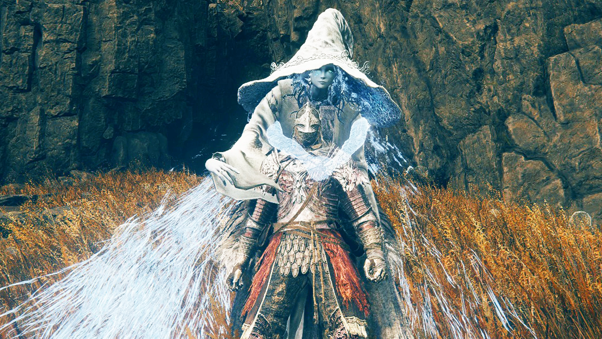 qzklwbhhlwdawcx3e9bejn-1 Elden Ring character with snow witch Ranni on their back with her arms around their neck