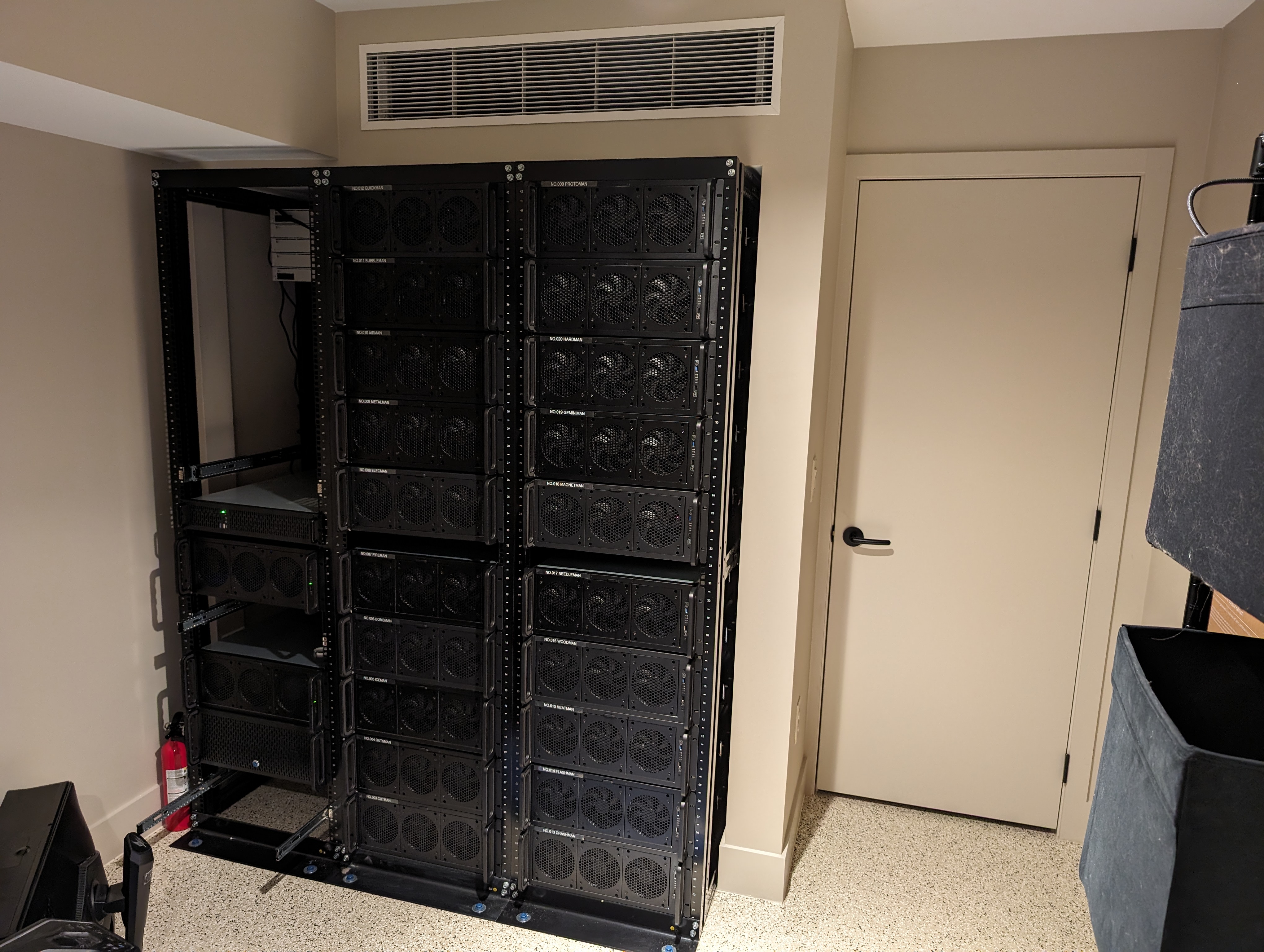 rrnmeeij5k546uhxvfs5qn An incredibly large server rack for a the residential setting of the LAN party house.