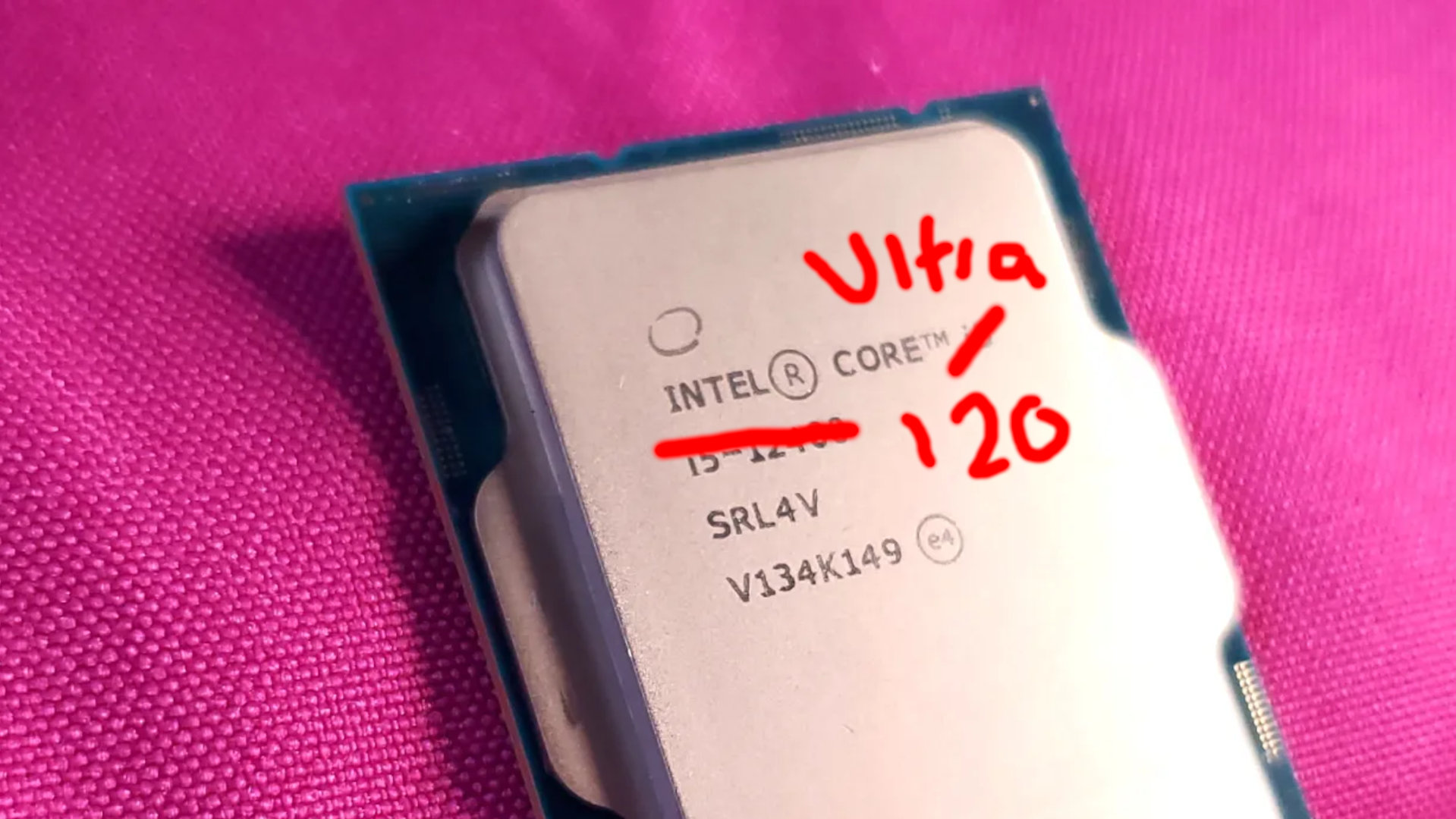 A photo of a Core i5 12400 processor, with its name crossed out and replaced with 'Ultra' and '120' to produce a comedic, fake Core Ultra 120 processor.